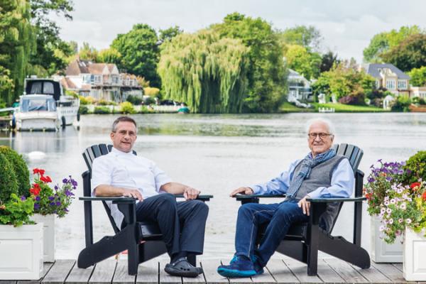 Michel and Alain Roux sitting outside The Waterside Inn in Bray