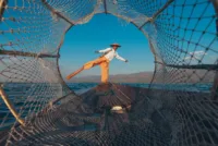APT--myanmar-inle-lake-fisherman-247-apt-high-res-cmyk
